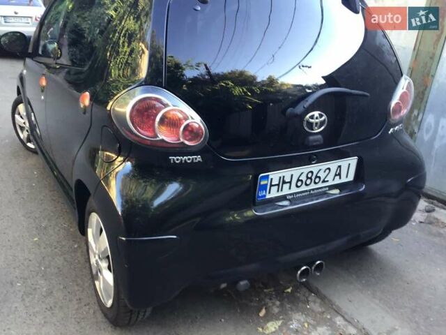 Чорний Тойота Айго, об'ємом двигуна 1 л та пробігом 262 тис. км за 5500 $, фото 6 на Automoto.ua