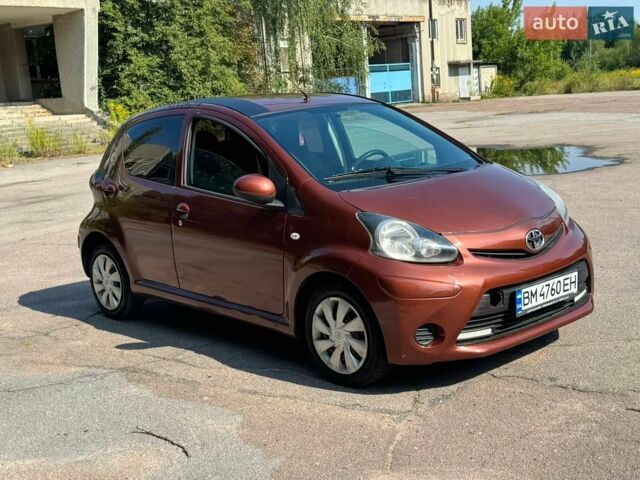 Коричневий Тойота Айго, об'ємом двигуна 1 л та пробігом 170 тис. км за 4000 $, фото 1 на Automoto.ua