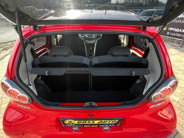 Красный Тойота Айго, объемом двигателя 1 л и пробегом 145 тыс. км за 4600 $, фото 13 на Automoto.ua