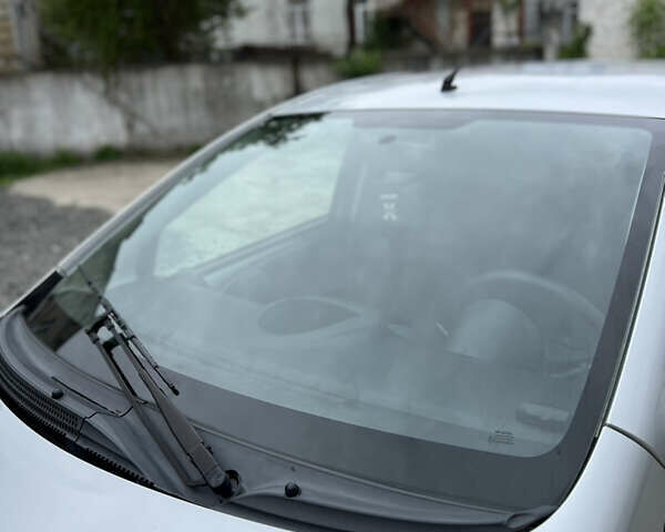 Сірий Тойота Айго, об'ємом двигуна 1 л та пробігом 197 тис. км за 5400 $, фото 5 на Automoto.ua