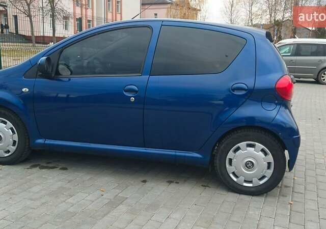 Синій Тойота Айго, об'ємом двигуна 1 л та пробігом 136 тис. км за 5400 $, фото 3 на Automoto.ua