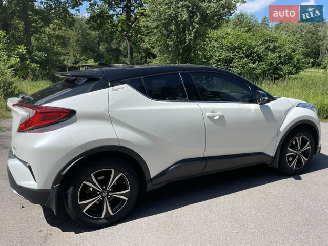 Белый Тойота C-HR, объемом двигателя 1.2 л и пробегом 81 тыс. км за 19000 $, фото 12 на Automoto.ua