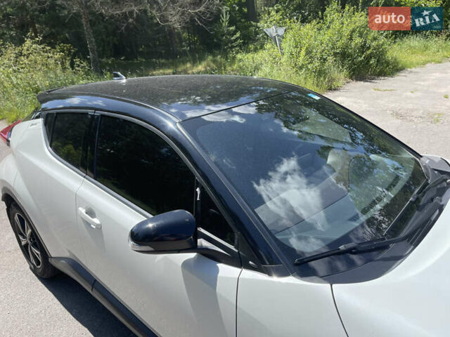Белый Тойота C-HR, объемом двигателя 1.2 л и пробегом 81 тыс. км за 19000 $, фото 14 на Automoto.ua