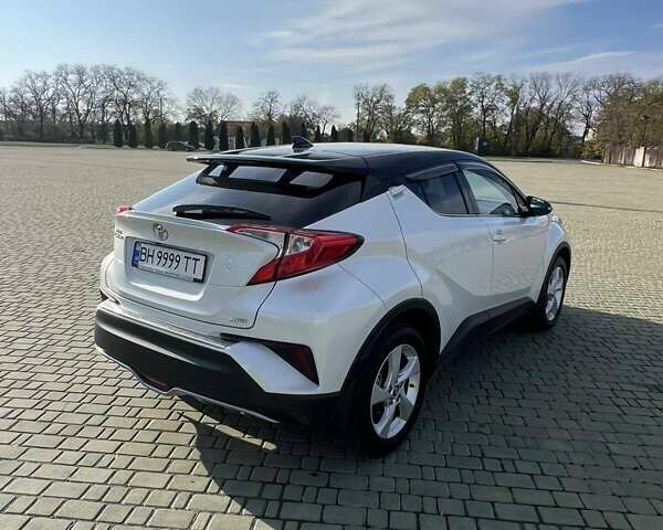 Белый Тойота C-HR, объемом двигателя 1.2 л и пробегом 168 тыс. км за 16900 $, фото 7 на Automoto.ua