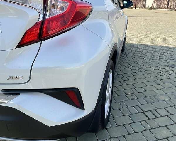 Белый Тойота C-HR, объемом двигателя 1.2 л и пробегом 168 тыс. км за 16900 $, фото 12 на Automoto.ua