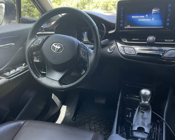 Белый Тойота C-HR, объемом двигателя 1.2 л и пробегом 81 тыс. км за 19000 $, фото 24 на Automoto.ua