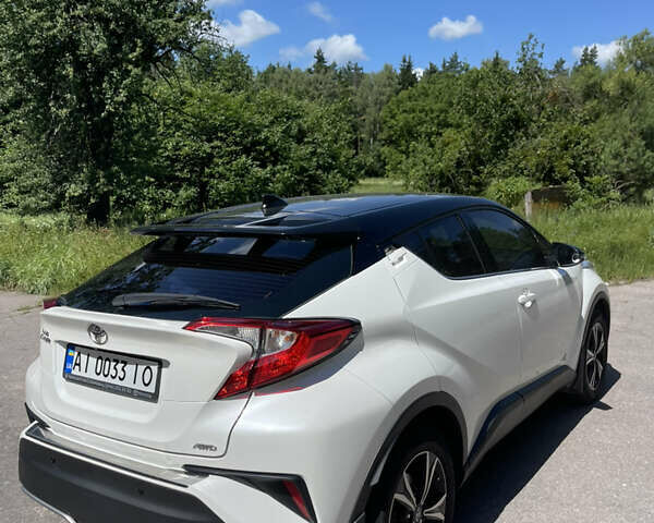 Белый Тойота C-HR, объемом двигателя 1.2 л и пробегом 81 тыс. км за 19000 $, фото 4 на Automoto.ua