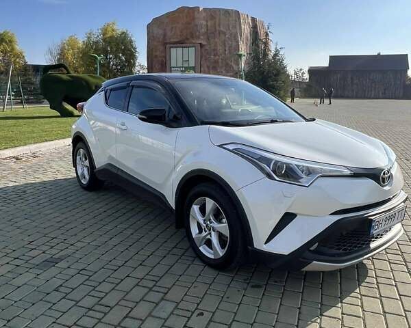 Белый Тойота C-HR, объемом двигателя 1.2 л и пробегом 168 тыс. км за 16900 $, фото 3 на Automoto.ua