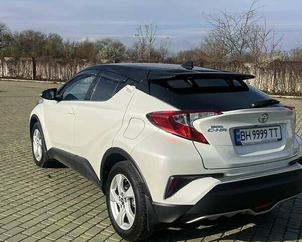 Белый Тойота C-HR, объемом двигателя 1.2 л и пробегом 168 тыс. км за 16900 $, фото 5 на Automoto.ua