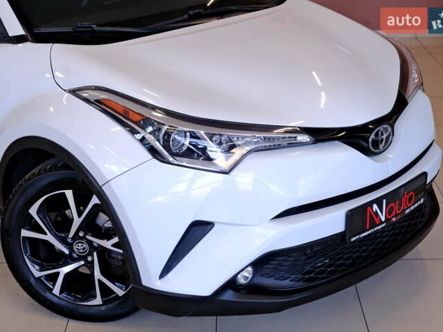 Белый Тойота C-HR, объемом двигателя 2 л и пробегом 94 тыс. км за 16900 $, фото 11 на Automoto.ua