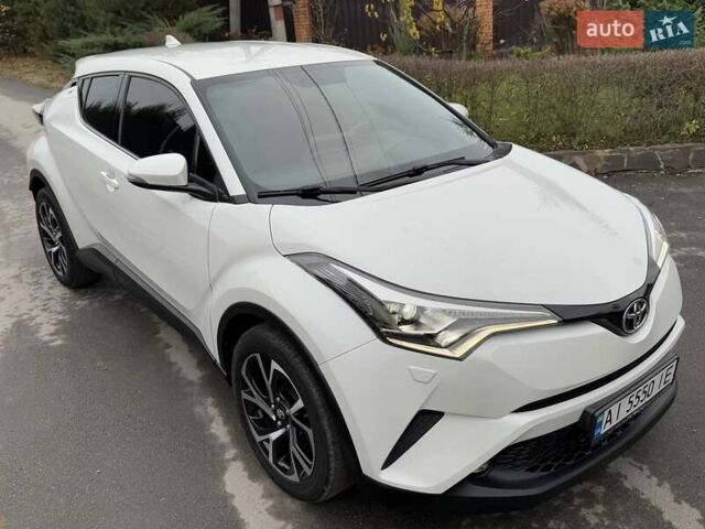 Белый Тойота C-HR, объемом двигателя 1.2 л и пробегом 88 тыс. км за 21500 $, фото 14 на Automoto.ua