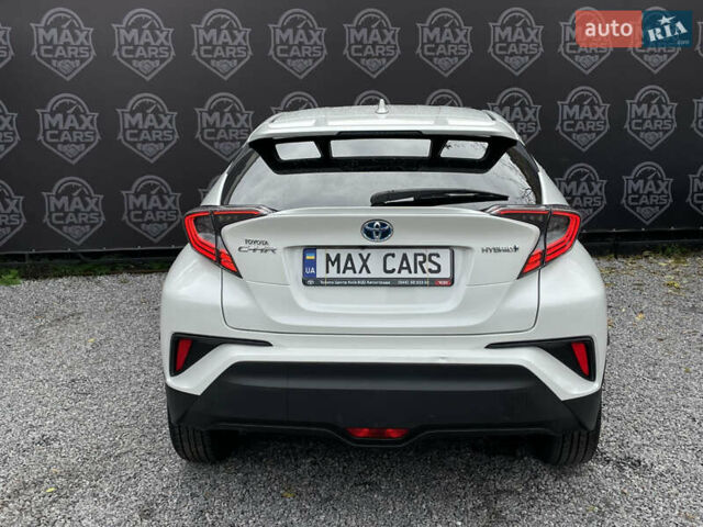 Тойота C-HR 2018 у Києві на Automoto.ua Білий Тойота C-HR, об'ємом двигуна 1.8 л та пробігом 74 тис. км за 22900 $, фото 5 на Automoto.ua