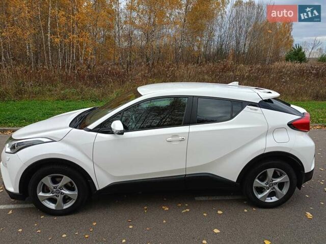 Белый Тойота C-HR, объемом двигателя 1.2 л и пробегом 93 тыс. км за 18698 $, фото 12 на Automoto.ua