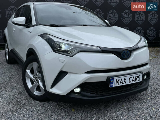Тойота C-HR 2018 у Києві на Automoto.ua Білий Тойота C-HR, об'ємом двигуна 1.8 л та пробігом 74 тис. км за 22900 $, фото 2 на Automoto.ua