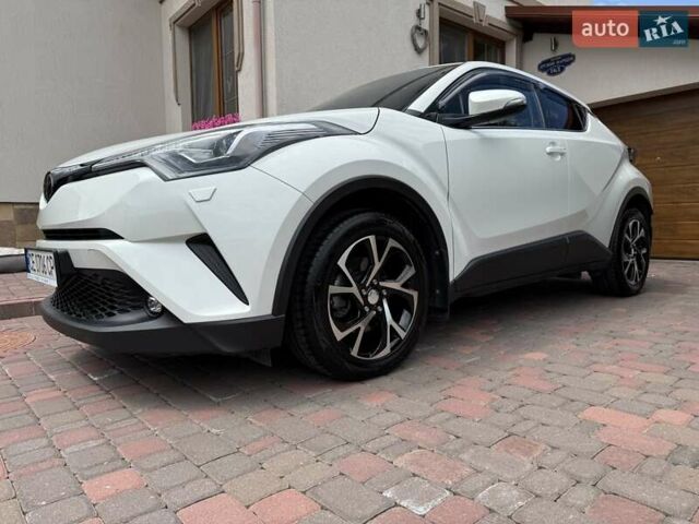 Белый Тойота C-HR, объемом двигателя 1.2 л и пробегом 65 тыс. км за 23000 $, фото 21 на Automoto.ua