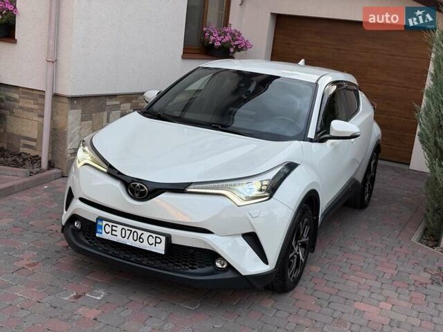 Белый Тойота C-HR, объемом двигателя 1.2 л и пробегом 65 тыс. км за 23000 $, фото 2 на Automoto.ua