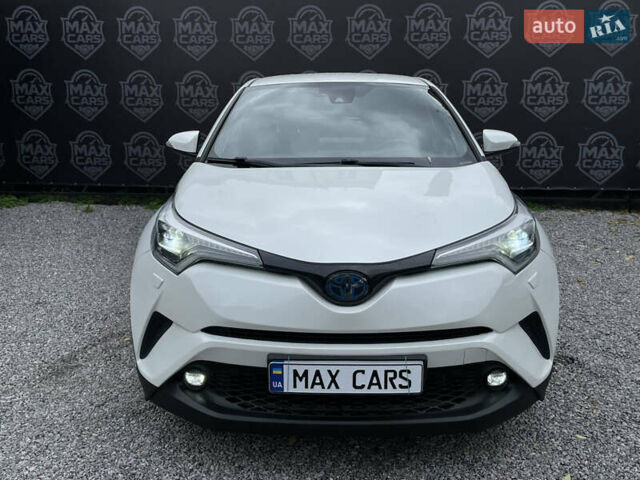 Тойота C-HR 2018 у Києві на Automoto.ua Білий Тойота C-HR, об'ємом двигуна 1.8 л та пробігом 74 тис. км за 22900 $, фото 3 на Automoto.ua