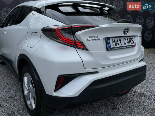 Тойота C-HR 2018 у Києві на Automoto.ua Білий Тойота C-HR, об'ємом двигуна 1.8 л та пробігом 74 тис. км за 22900 $, фото 7 на Automoto.ua