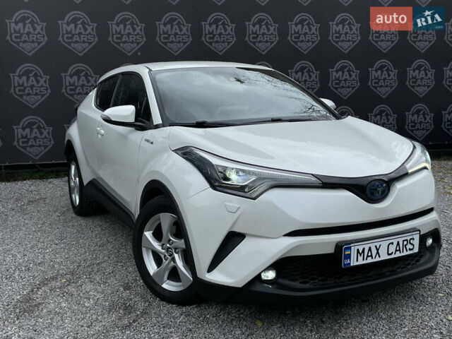 Тойота C-HR 2018 у Києві на Automoto.ua Білий Тойота C-HR, об'ємом двигуна 1.8 л та пробігом 74 тис. км за 22900 $, фото 1 на Automoto.ua