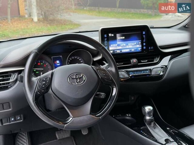 Белый Тойота C-HR, объемом двигателя 1.2 л и пробегом 88 тыс. км за 21500 $, фото 27 на Automoto.ua