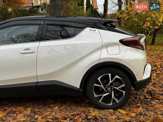Белый Тойота C-HR, объемом двигателя 1.8 л и пробегом 79 тыс. км за 26290 $, фото 9 на Automoto.ua
