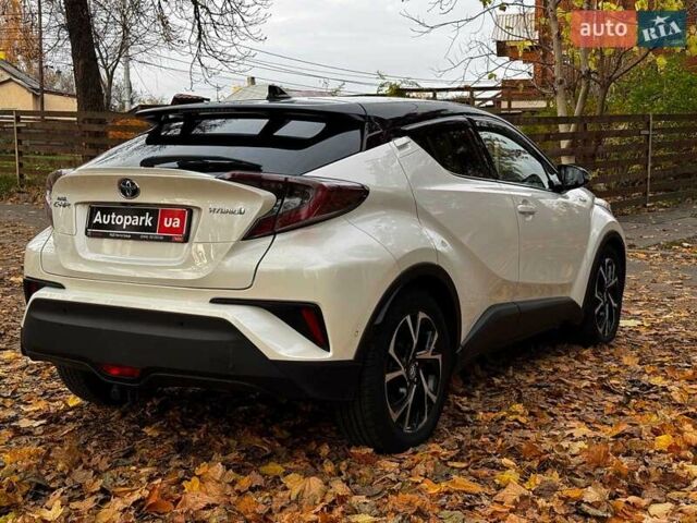 Белый Тойота C-HR, объемом двигателя 1.8 л и пробегом 79 тыс. км за 26290 $, фото 6 на Automoto.ua