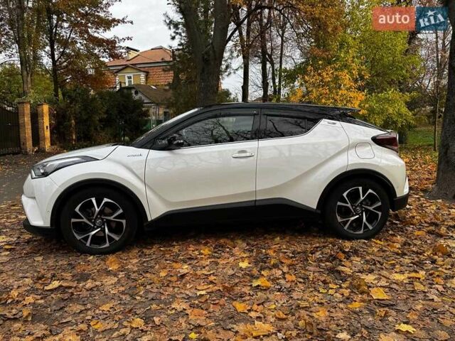 Белый Тойота C-HR, объемом двигателя 1.8 л и пробегом 79 тыс. км за 26290 $, фото 11 на Automoto.ua