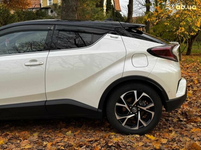 Белый Тойота C-HR, объемом двигателя 1.8 л и пробегом 79 тыс. км за 26290 $, фото 9 на Automoto.ua