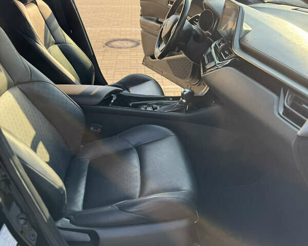 Черный Тойота C-HR, объемом двигателя 1.2 л и пробегом 142 тыс. км за 18000 $, фото 12 на Automoto.ua