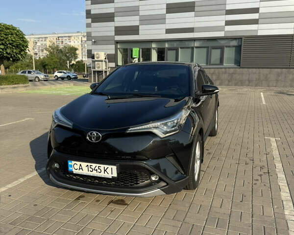Черный Тойота C-HR, объемом двигателя 1.2 л и пробегом 142 тыс. км за 18000 $, фото 1 на Automoto.ua