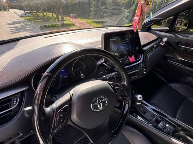 Коричневий Тойота C-HR, об'ємом двигуна 0 л та пробігом 128 тис. км за 23900 $, фото 6 на Automoto.ua