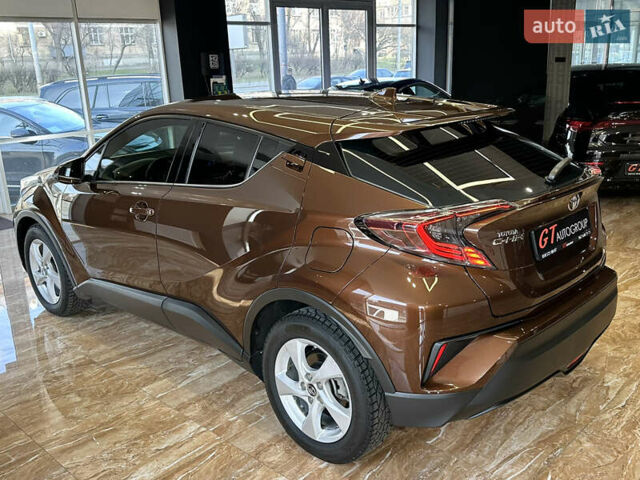 Коричневый Тойота C-HR, объемом двигателя 1.2 л и пробегом 56 тыс. км за 18900 $, фото 12 на Automoto.ua