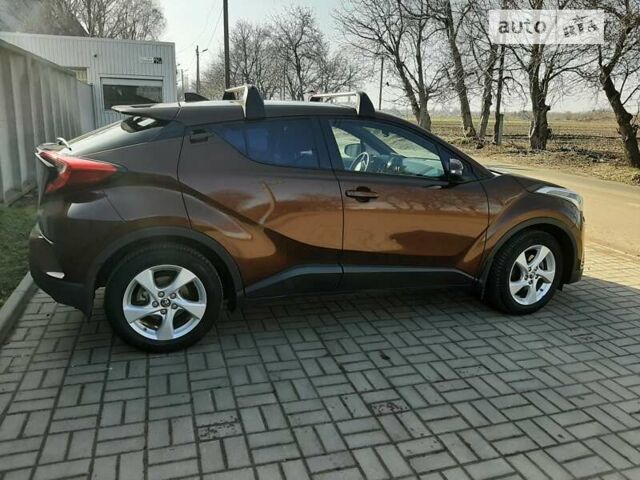 Коричневый Тойота C-HR, объемом двигателя 1.2 л и пробегом 143 тыс. км за 18500 $, фото 3 на Automoto.ua