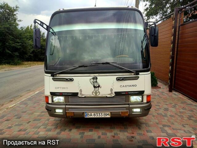 Білий Тойота Коетано, об'ємом двигуна 4.2 л та пробігом 488 тис. км за 9400 $, фото 6 на Automoto.ua