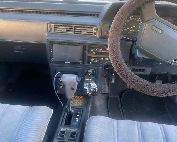 Белый Тойота Камри, объемом двигателя 1.8 л и пробегом 218 тыс. км за 1800 $, фото 8 на Automoto.ua