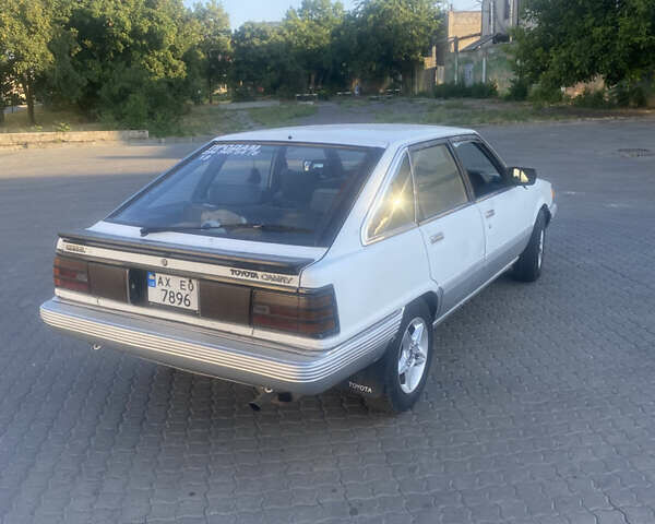 Белый Тойота Камри, объемом двигателя 1.8 л и пробегом 218 тыс. км за 1800 $, фото 4 на Automoto.ua