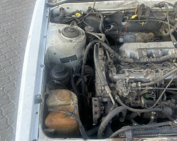 Белый Тойота Камри, объемом двигателя 1.8 л и пробегом 218 тыс. км за 1800 $, фото 11 на Automoto.ua