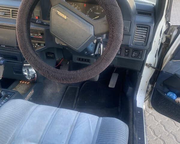 Белый Тойота Камри, объемом двигателя 1.8 л и пробегом 218 тыс. км за 1800 $, фото 9 на Automoto.ua