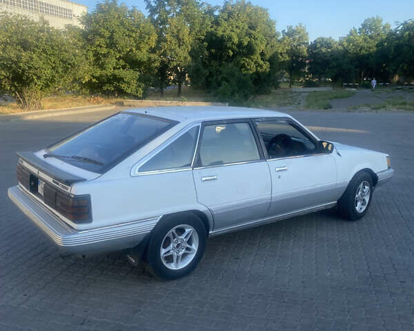 Белый Тойота Камри, объемом двигателя 1.8 л и пробегом 218 тыс. км за 1800 $, фото 5 на Automoto.ua