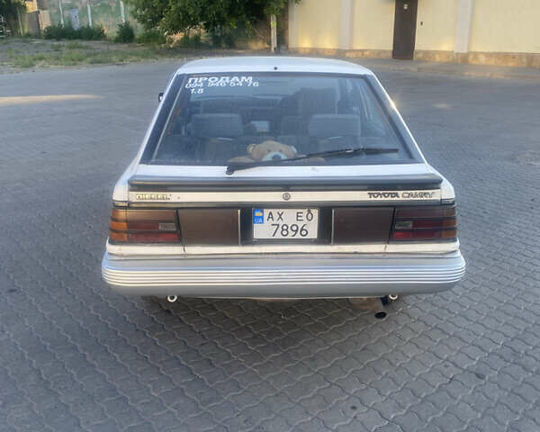 Белый Тойота Камри, объемом двигателя 1.8 л и пробегом 218 тыс. км за 1800 $, фото 3 на Automoto.ua