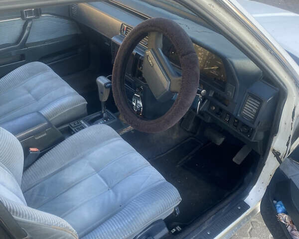 Белый Тойота Камри, объемом двигателя 1.8 л и пробегом 218 тыс. км за 1800 $, фото 7 на Automoto.ua