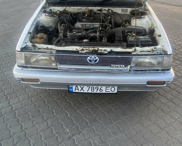 Белый Тойота Камри, объемом двигателя 1.8 л и пробегом 218 тыс. км за 1800 $, фото 13 на Automoto.ua