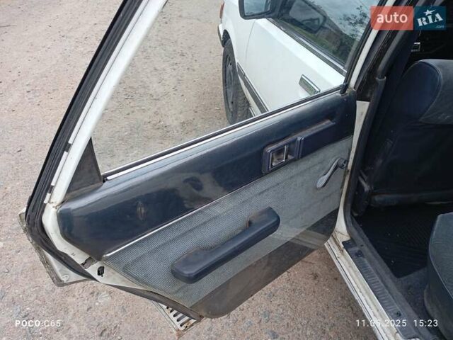 Білий Тойота Камрі, об'ємом двигуна 1.8 л та пробігом 350 тис. км за 700 $, фото 10 на Automoto.ua