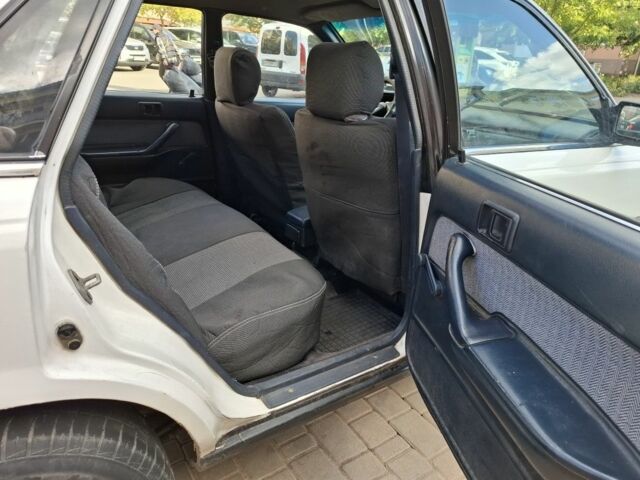 Белый Тойота Камри, объемом двигателя 2 л и пробегом 315 тыс. км за 1100 $, фото 12 на Automoto.ua