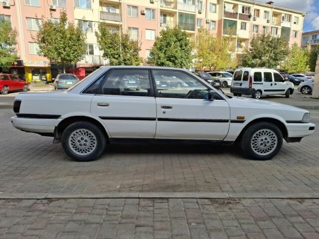 Белый Тойота Камри, объемом двигателя 2 л и пробегом 315 тыс. км за 1100 $, фото 3 на Automoto.ua