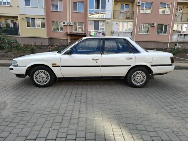 Белый Тойота Камри, объемом двигателя 2 л и пробегом 315 тыс. км за 1100 $, фото 7 на Automoto.ua