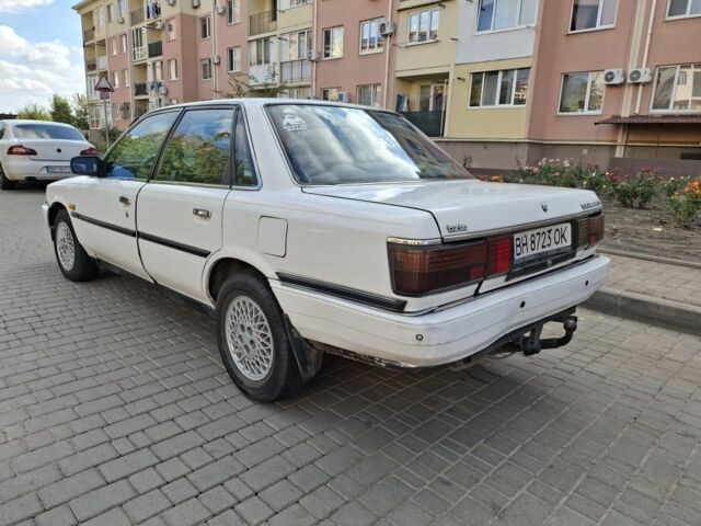 Белый Тойота Камри, объемом двигателя 2 л и пробегом 315 тыс. км за 1100 $, фото 6 на Automoto.ua