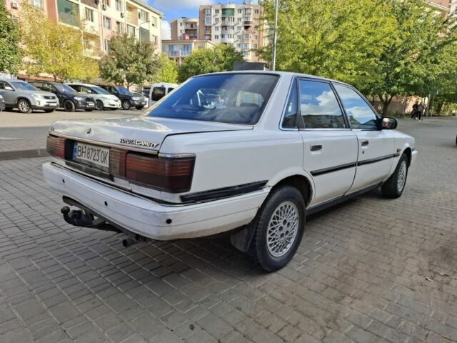 Белый Тойота Камри, объемом двигателя 2 л и пробегом 315 тыс. км за 1100 $, фото 4 на Automoto.ua