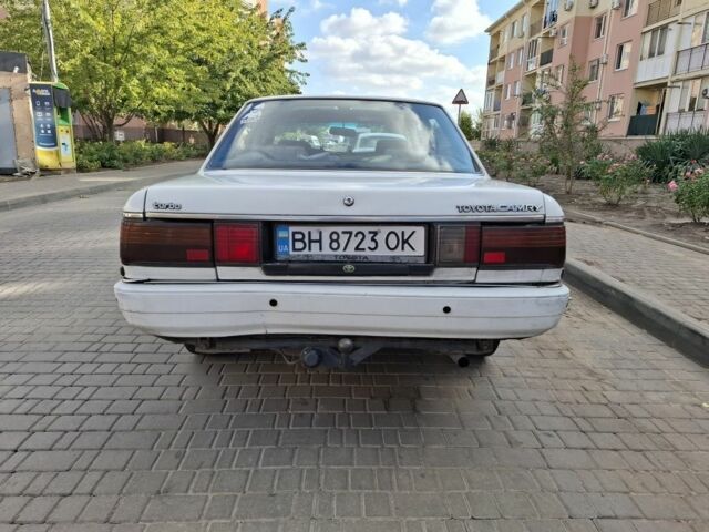 Белый Тойота Камри, объемом двигателя 2 л и пробегом 315 тыс. км за 1100 $, фото 5 на Automoto.ua