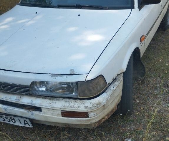 Білий Тойота Камрі, об'ємом двигуна 2 л та пробігом 234 тис. км за 357 $, фото 5 на Automoto.ua